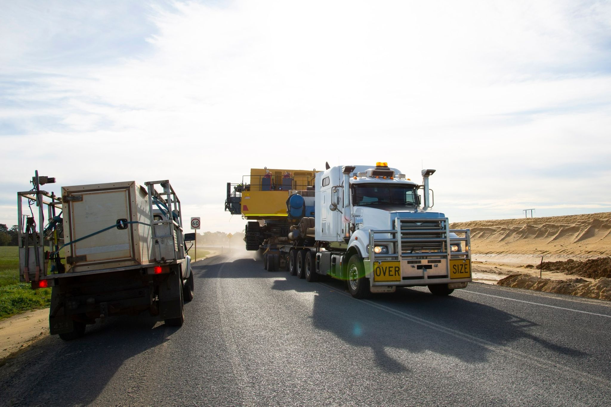 Docceleration semi truck hauling freight on an open highway